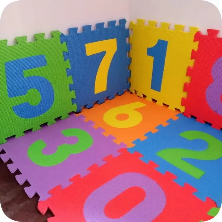 kids-playing-foam-mat-of-number-puzzle-pieces-791927.webp